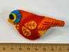 Bright orange and yellow finch felt brooch with a blue and yellow eye