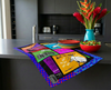 linen tea towel printed with a comic book style story about white ibis being released from zoos on a kitchen bench with a bunch of tropical flowers and a salad
