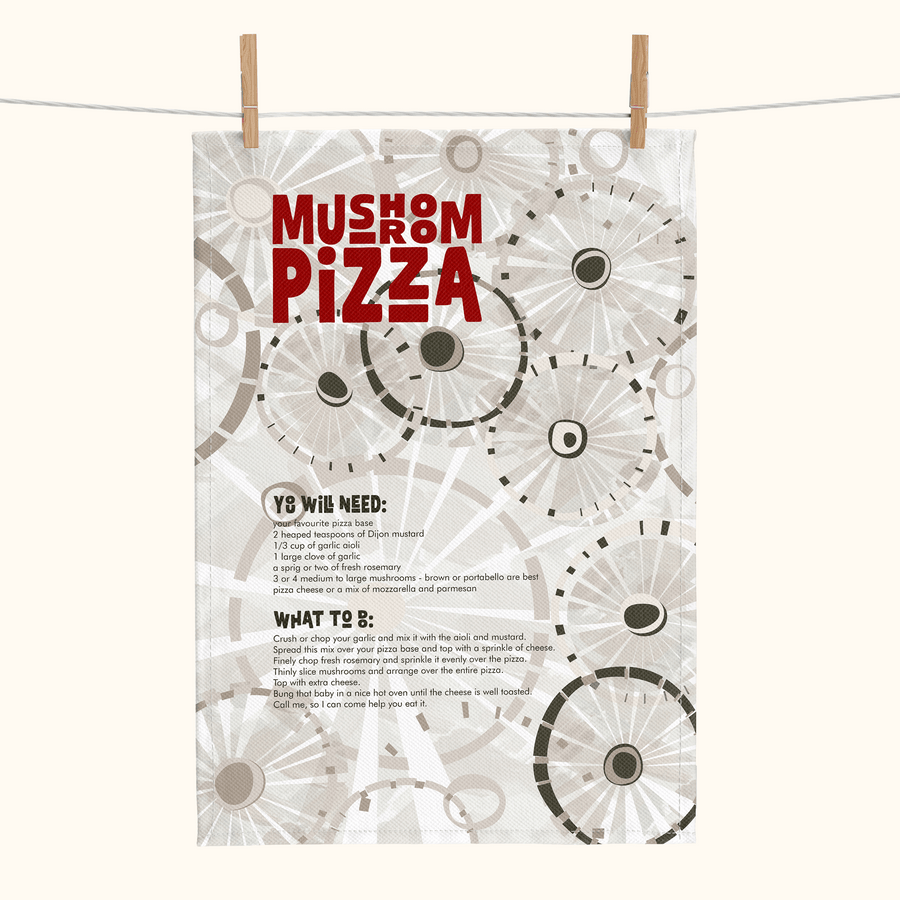 linen tea towel  with a mushroom pattern and a mushroom pizza recipe