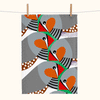 linen tea towel printed with large stylised zebra finches on a green background