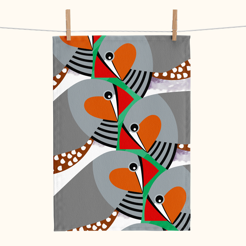 linen tea towel printed with large stylised zebra finches on a green background