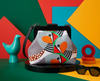 clutch purse with large stylised zebra finch pattern, black timber frame and black metal strap