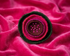Layered felt flower brooch in pinks and deep green